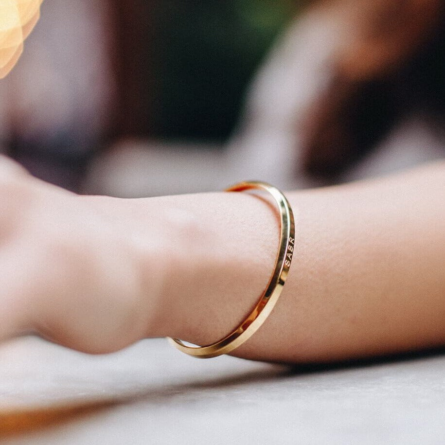 Sabr Cuff Bracelet in Rose Gold shown being worn by Crscnt Moon
