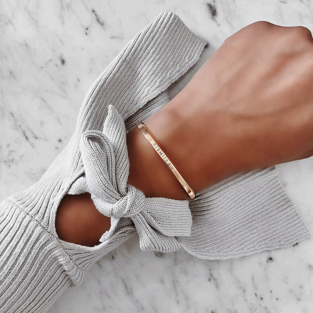 
            
                Load image into Gallery viewer, Woman Wearing Bismillah Cuff Bracelet in Rose Gold by Crscnt Moon
            
        